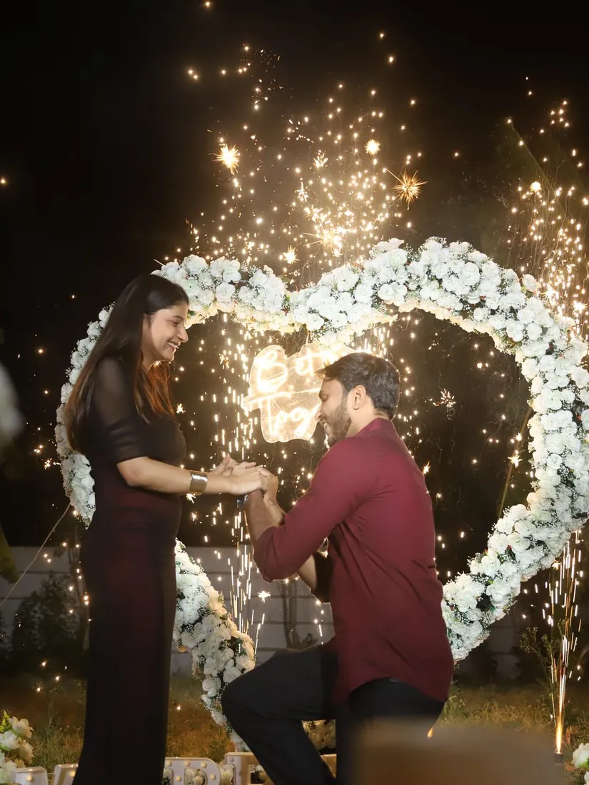 Kneeling Proposal with Fireworks